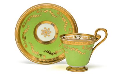Ornamented cup and saucer, - Starožitnosti (Nábytek, Sochařská díla, Sklo, Porcelán)
