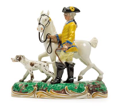 A figure of a mounted huntsman and hound, - Works of Art