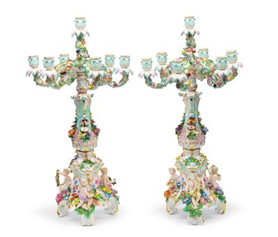 A pair of candelabras with children and seven candle sockets each, - Nábytek