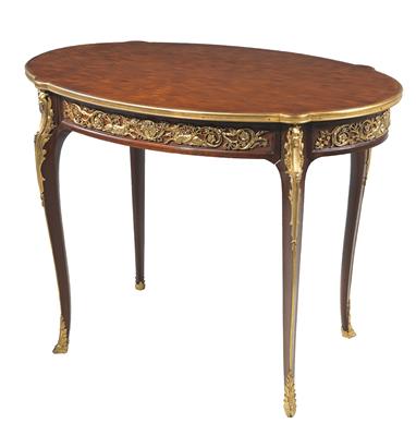 An oval-shaped salon table, - Works of Art - Furniture, Sculptures, Glass and Porcelain