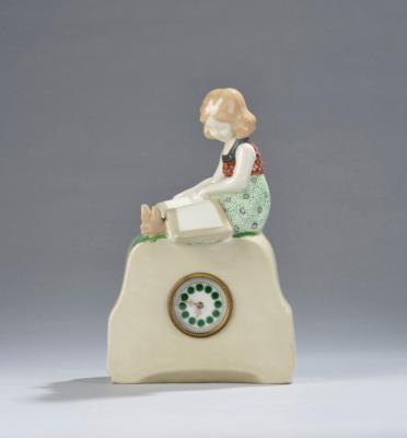 Polter, a clock with a seated girl reading a large book, model number 4388, Wiener Manufaktur Friedrich Goldscheider, by 1920 - Secese a umění 20. století