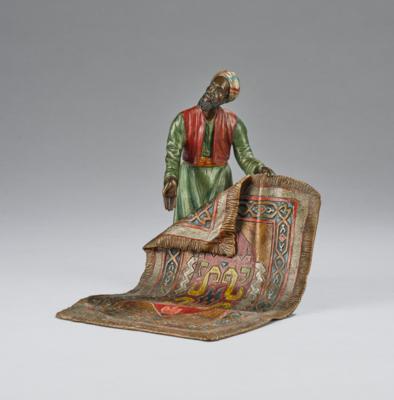 A bronze object depicting a carpet seller, in the style of F. X. Bergmann - Jugendstil e arte applicata del XX secolo