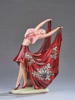 Stephan Dakon, a figurine "Beauty"/"Schönheit" (a female dancer, leaning to the left, holding her dress open like a wing, on an oval base), model number 8746, designed in around 1935, executed by Manufaktur Josef Schuster (formerly Friedrich Goldscheider) - Secese a umění 20. století