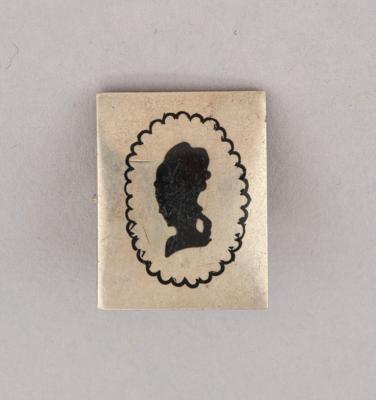 A brooch: lady with hairdo (original title: "Brosche: Dame mit Frisur"), model number S 3979, Georg Stöger for the Wiener Werkstätte, as of 1922 - Secese a umění 20. století
