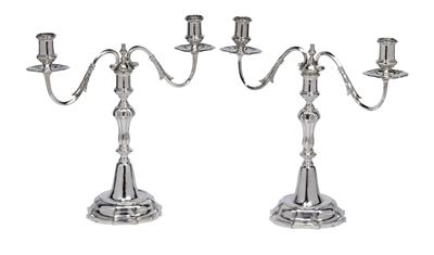 A pair of candleholders, - Stříbro