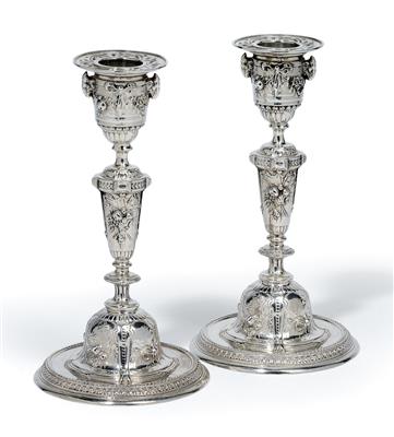 A pair of candleholders from France, - Silver