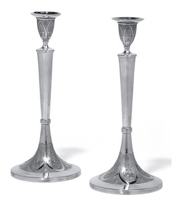 A pair of candleholders from Kaschau, - Argenti