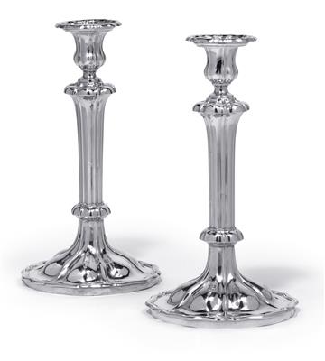 A pair of candleholders from Vienna, - Silver