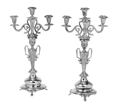 A pair of four-light candleholders from Vienna, - Silver
