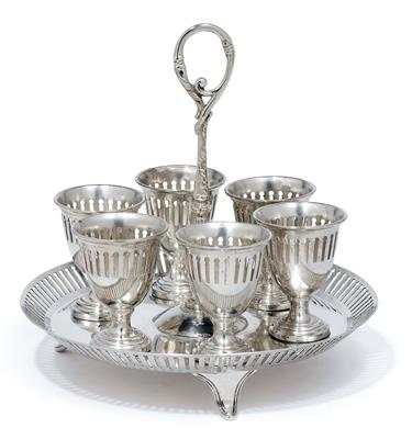 An egg cup set from London, - Silver