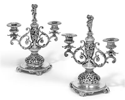 A pair of two-light candleholders from Pest, - Silver