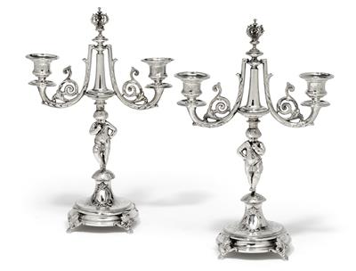 A pair of two-light candleholders from Vienna, - Silver and Russian Silver