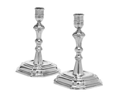 A Pair of Candleholders, - Silver and Russian Silver