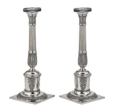 A Pair of Candleholders, - Silver and Russian Silver