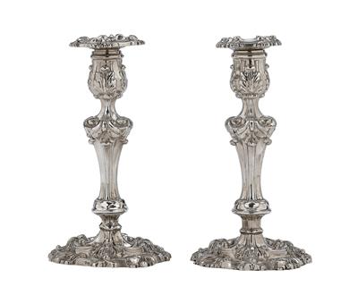 A Pair of Candleholders from London, - Silver and Russian Silver