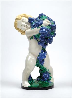 Michael Powolny, a putto with grapes - autumn, designed c. 1907, executed by Gmundner Keramik, c. 1919 - Jugendstil e arte applicata del XX secolo