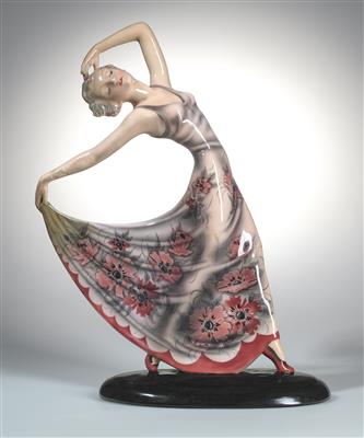 Josef Lorenzl, a female dancer posing, holding her dress open with her right hand, standing on an oval base, designed in c. 1935, executed by Wiener Manufaktur Friedrich Goldscheider, by c. 1941 - Jugendstil and 20th Century Arts and Crafts