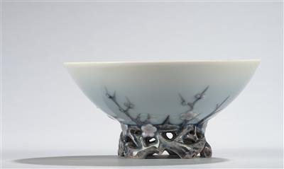 A centrepiece bowl with dragonfly and sculptural vegetal