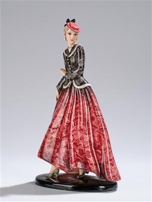 A striding lady with hat, short top and long skirt (on an oval base), executed by Wiener Manufaktur Friedrich Goldscheider, by c. 1941 - Secese a umění 20. století
