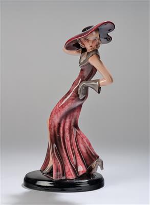 Claire (Klára) White (i.e. Claire/Klára Herczeg), an elegant lady standing with large hat and long gloves on an oval base, model number: 8151, designed in c. 1935, executed by Wiener Manufaktur Friedrich Goldscheider, by c. 1941 - Jugendstil e arte applicata del XX secolo