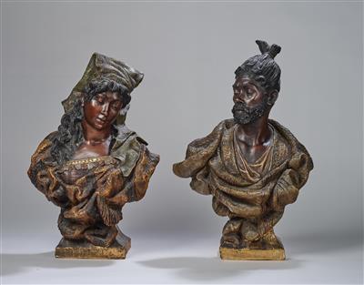 A pair of busts: a “Singhalese man” (with beard and tied up hair) and a “Singhalese woman” (with headscarf and coin chain as necklace), designed in c. 1890/95, executed by Wiener Manufaktur Goldscheider, by c. 1898 - Secese a umění 20. století