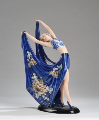 Stephan Dakon, a figurine “Beauty” (a female dancer, leaning to the right, holding her dress open like a wing) on an oval base, model number 7195, designed in around 1935, executed by Wiener Manufaktur Friedrich Goldscheider, by c. 1941 - Jugendstil and 20th Century Arts and Crafts