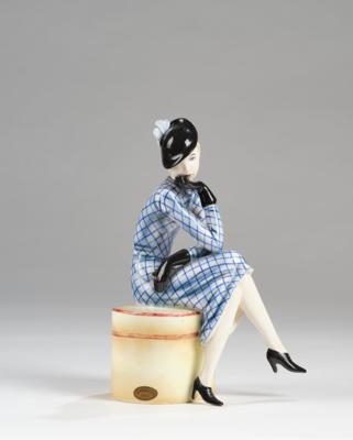 Stephan Dakon, a female figure with hat and gloves, sitting on a hatbox, model number 7408, executed by Wiener Manufaktur Friedrich Goldscheider, by c. 1941 - Secese a umění 20. století