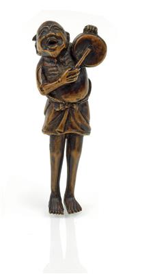 Netsuke eines Mannes mit Trommel - Antiquitäten