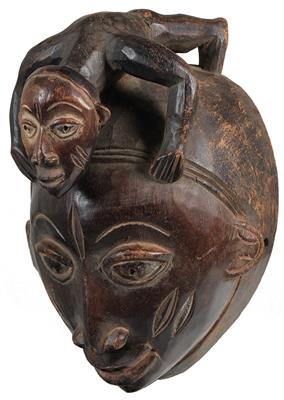 Yoruba, Nigeria: Eine Aufsatz-Maske vom Typ 'Gelede', mit einer mitgeschnitzten, männlichen Figur. - Antiquariato