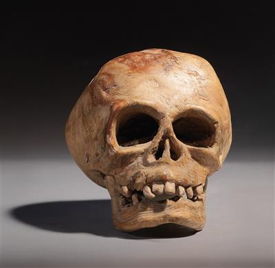 A carved wood skull, - Antiques