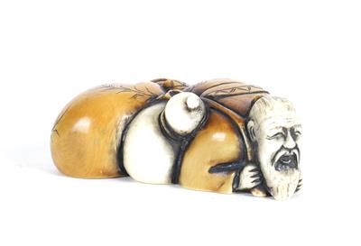 Netsuke eines liegenden Mannes - Antiquitäten