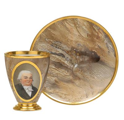A cup decorated with a gentleman’s portrait, with saucer, - Glass and porcelain