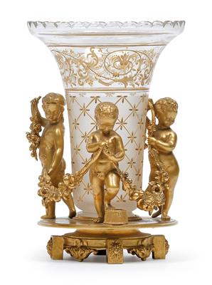 A glass vase, with 3 amorettes and gilt mount, - Sklo, Porcelán