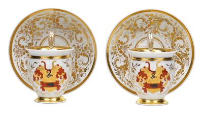 A pair of armorial cups with saucer, - Glass and porcelain