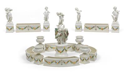 A decorative epergne with the 4 seasons and a column with amorettes, - Glass and porcelain