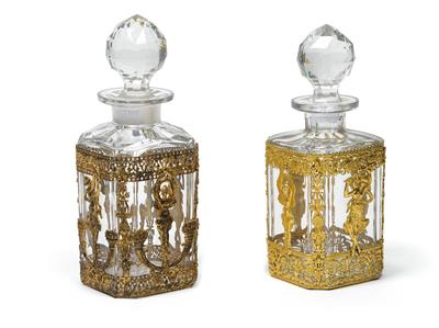 Two carafes with stoppers and gilt mounts, - Sklo, Porcelán