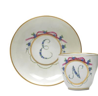 A cup bearing the floral monogram N, the saucer monogrammed E, - Glass and porcelain