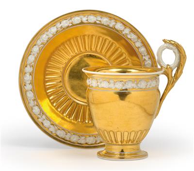 A gilt cup with gilt saucer, - Glass and porcelain