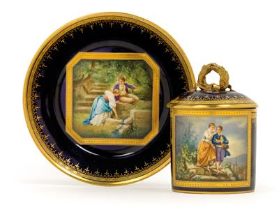 “Herrmann and Dorothea” and “Hermann and Dorothea by the Fountain” – A lidded cup and saucer, - Vetri e porcellane