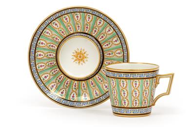 A design cup and saucer, - Glass and porcelain
