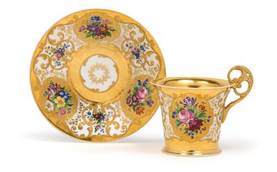 A gilt cup with a gilt saucer, - Glass and porcelain