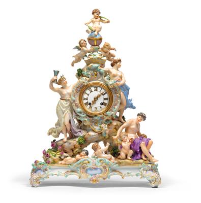 A porcelain clockcase with amorettes and allegories, - Sklo a Porcelán