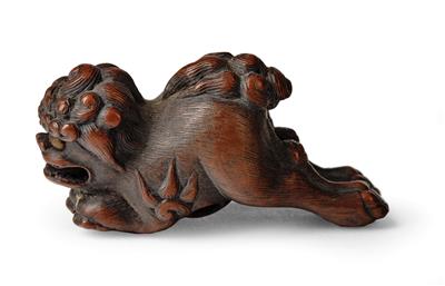 A Netsuke of a Running Shishi, Japan, 19th Century, Signed Masahide, - Starožitnosti - Část 1