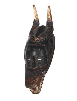 Guro, Elfenbeinküste: Ein sehr bekannter Maskentyp der Guro, 'Zamble' genannt. Halb Mensch, halb Tier. - Stammeskunst / Tribal-Art