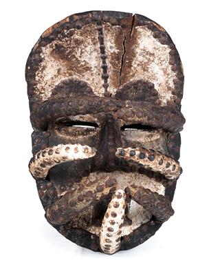 Bete or Ngere, Ivory Coast: a rare and unusual mask type, with seven curved spikes that protrude from the bottom edge of the mask. - Tribal Art