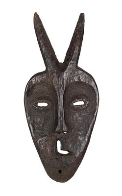 Lega (also Warega or Rega), Dem. Rep. of Congo: an unusual face mask with two horns and a ‘crooked’ mouth. Type: ‘Kayamba’ (antelope). - Tribal Art