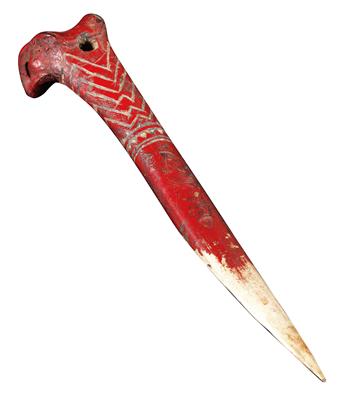 New Guinea, north coast, province of Morobe: a Kukukuku dagger. Made of cassowary bone, carved and painted red. - Tribal Art