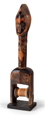 Guro, Ivory Coast: a tall heddle pulley, with a fine and typical head of a Guro woman above. - Tribal Art