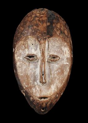 Lega (also Warega or Rega), Dem. Rep. of Congo: a relatively large ‘lukwakongo’ identity mask made from medium-weight brown wood, with an old patina. - Tribal Art