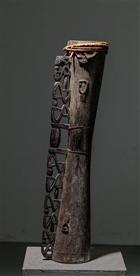 A large Asmat drum with human figures in relief. - Tribal Art
